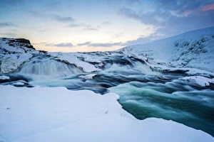 Iceland, Europe. Frozen Gullfoss waterfall in wintertime