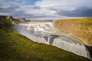 Cascade Collection: Iceland, Gullfoss at sunset, rainbow and water steam, icelandic landscape