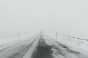 Iceland. Mountain road with snow