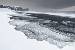 Images Dated 19th March 2014: Iceland, South Iceland, Dyrholaey, Snowy beach of Dyrholaey