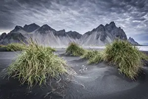 Iceland, Vestrahorn mount and black sand beach in foreground, near Vik
