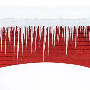 Timber Prints: Icicles and snow on a red timber house, Bergsbotn, Senja, Norway
