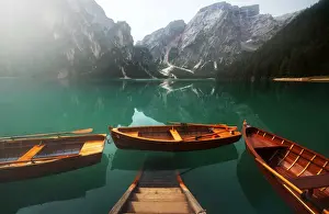 The iconic Braies lake (Pragser Wildsee) during a summer morning in the Dolomites, Italy