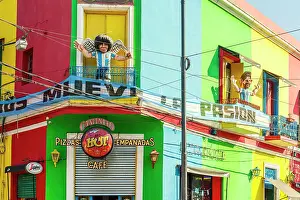 Buenos Aires Prints: The iconic figure of Maradona on a balcony in Caminito, La Boca, Buenos Aires, Argentina