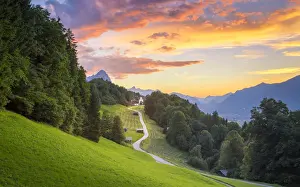 Roads Prints: The iconic Wamberg Church, with Mount Alpspitze and Zugspitze on the background. Wamberg