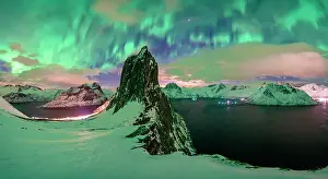 Aurora Borealis Prints: Icy fjords and Segla mountain covered with snow under the Northern Lights