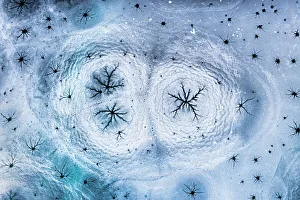 Editor's Picks: Icy shape on the surface of the alpine lake. Palpuognasee, Canton of Graubunden