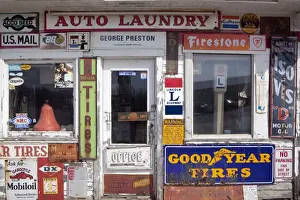 Pump Prints: Idaho, USA. Signs on an old gas station in the American Midwest