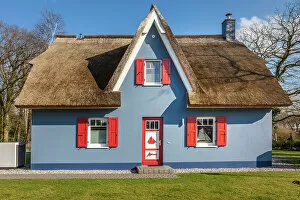 Images Dated 2nd November 2022: Idyllic blue thatched cottage in Wieck am Darss, Mecklenburg-West Pomerania, Baltic Sea