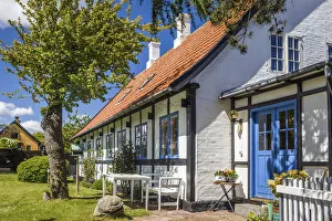 Denmark Prints: Idyllic half-timbered house in Svaneke on Bornholm, Denmark