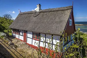 Idyllic half-timbered house in Svaneke on Bornholm, Denmark