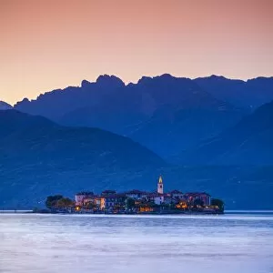 Maggiore Lake Gallery: The idyllic Isola dei Pescatori (Fishermans Islands) illuminated at dusk, Borromean Islands
