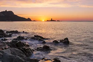 Costa Azzurra Prints: The Ile d Or silhouette at sunrise, viewed from Cap Dramont beach, Saint-Raphae
