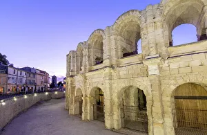2 People Prints: Illuminated Arles Amphitheatre at Dusk, Arles, Bouches-du-Rhone, France
