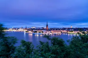 Viewpoint Prints: Illuminated buildings of Gamla Stan at dusk from Monteliusvagen