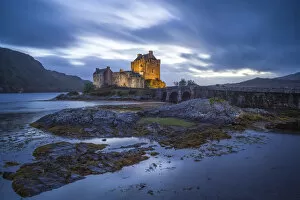 Images Dated 20th September 2019: Illuminated Eilean Donan Castle at dusk, The Highlands, Scotland, United Kingdom