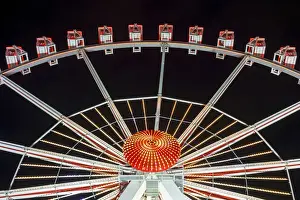 Illuminated Ferris Wheel at Hamburger DOM funfair at night, St. Pauli, Hamburg, Germany