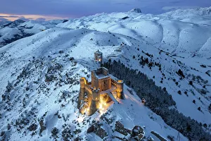 Images Dated 1st June 2023: Illuminated high angle view of the castle of Rocca Calascio and the church Santa Maria della Pieta