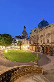 Saxony Prints: Illuminated park near Frauenkirche church at twilight, Dresden, Saxony, Germany