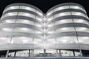Images Dated 3rd October 2014: Illuminated parking garage concrete structure at night, Hamburg, Germany