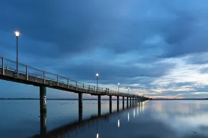 Wismar Prints: Illuminated Pier Wendorf at dawn