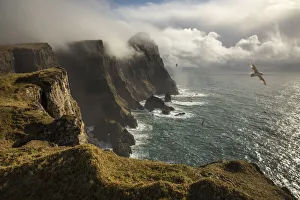 Cloudy Sky Prints: The impressive coast on the west side of Suðuroy seen from Eggjarnar