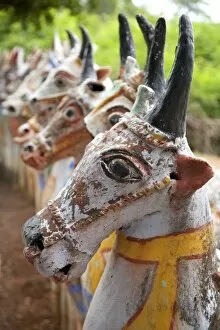 India, Chettinad. Terracotta horses lined up by the Ayyanar Temple. Although they have horns