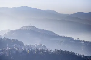 India, Himachal Pradesh, Shimla, View of mountains from The Ridge at dawn