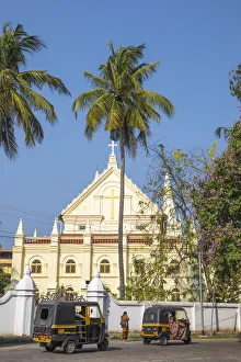 Catholic Churches Prints: India, Kerala, Cochin - Kochi, Fort Kochi, Auto rickshaws passing infront of the Santa