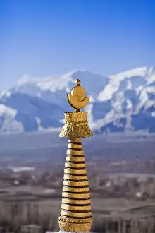 Gelugpa Prints: India, Ladakh, Thiksey. The golden finial of a chorten at Thiksey Monastery