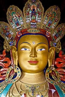 Silk Route Collection: India, Ladakh, Thiksey. The immense and beautifully gilded Maitreya Buddha in the Chamkhang temple