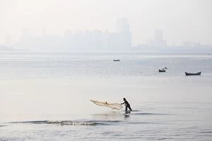 India Collection: India, Maharashtra, Mumbai, Chowpatty, Man fishing