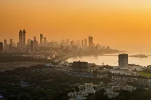 Images Dated 6th February 2014: India, Maharashtra, Mumbai, sunset over the city centre and Haji Ali Bay and mosque