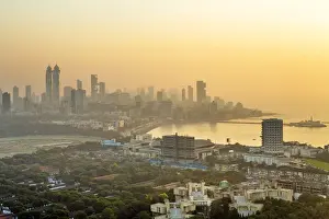 Bombay Prints: India, Mumbai, Mahalakshmi. Sunset over Haji Ali Bay showing Haji Ali Dargah tomb, NSCI