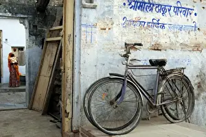 Southern India Prints: India, Rajasthan, Narlai. Bikes rest outside the doors of a traditional house in the remote village of