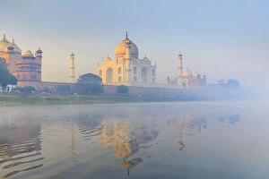 Images Dated 10th February 2018: India, Taj Mahal reflecting in the Yamuna river on a foggy morning