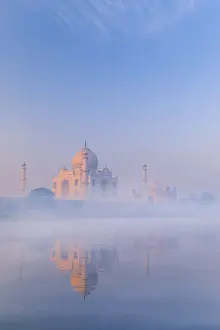 Agra Prints: India, Taj Mahal reflecting in the Yamuna river on a foggy morning