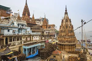 India, Uttar Pradesh, Varanasi, Manikarnika Ghat - The main burning ghat, Stacks of