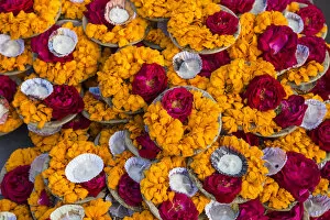 India, Uttar Pradesh, Varanasi, Flower offerings at Dashashwamedh Ghat - The main