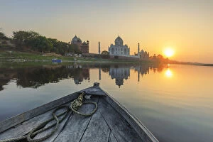 Agra Gallery: India, view of the Taj Mahal reflecting in the Yamuna river at sunset from a wooden boat