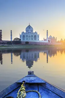 India Prints: India, view of the Taj Mahal reflecting in the Yamuna river at sunset from a wooden boat
