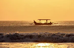 Images Dated 28th November 2019: Indonesia, Bali, Kuta; fishing outriggers on the beach of Kuta