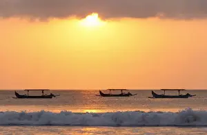 Peter Fischer Prints: Indonesia, Bali, Kuta; fishing outriggers on the beach of Kuta; at sunset