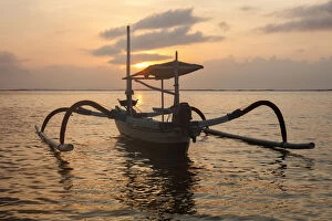 Indonesia, Bali, Sanur, fishing outriggers at dawn