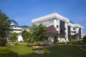 Sumatra Prints: Indonesia, Sumatra, Medan, Mosque and Building next to Water Tower