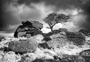 Infrared Prints: Infrared view of Emsworthy Rocks against a stormy sky