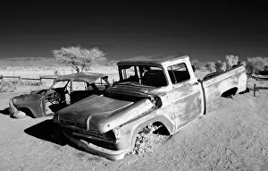 Abandoned Prints: Infrared view of the shells of old cars at the remote settlement of Solitaire