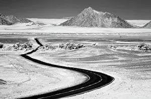 Namibia Prints: Infrared view of tarmac road winding through the Namib Desert, Sesriem, Namibia