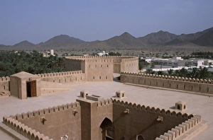 Crenellated Prints: The interior courtyard and a watchtower within Al Hazm Castle