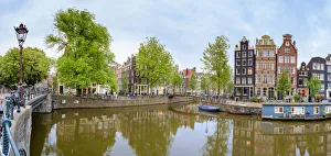 Intersection of the Herngracht with the Brouwersgracht at dusk, Amsterdam, North Holland
